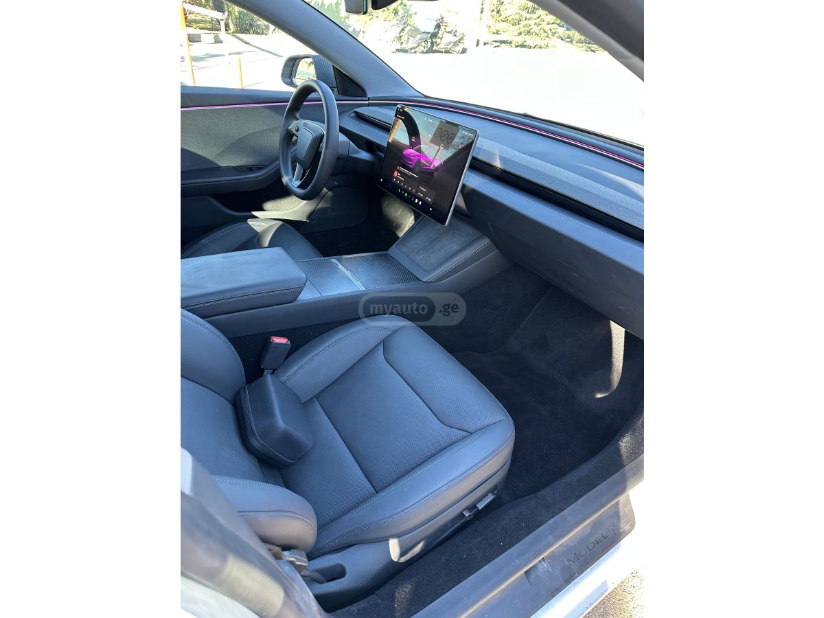 Tesla Model 3 - фото 7