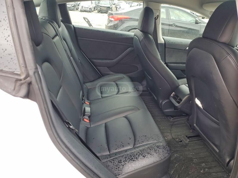 Tesla Model 3 - фото 9