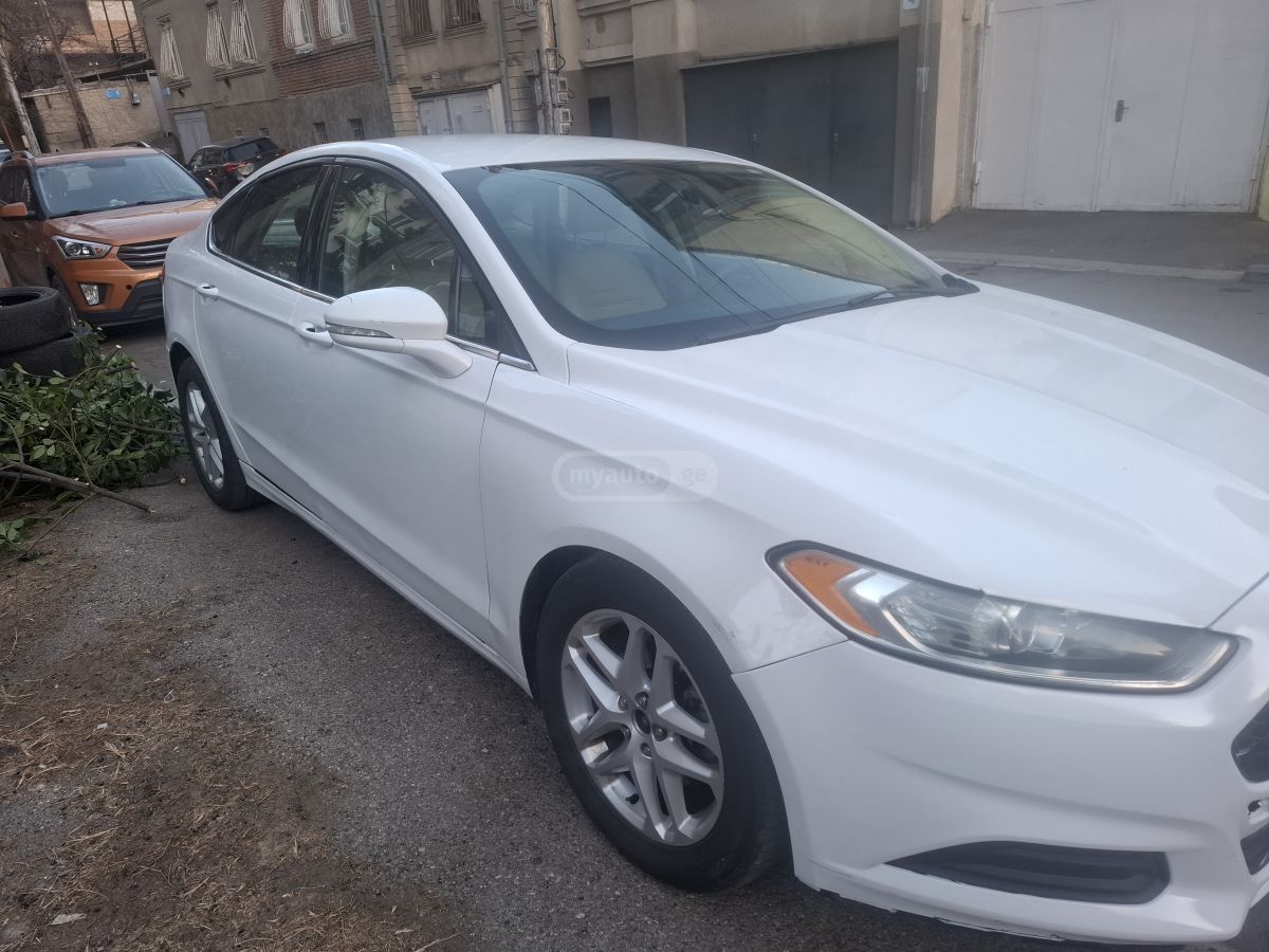 Ford Fusion - фото 10