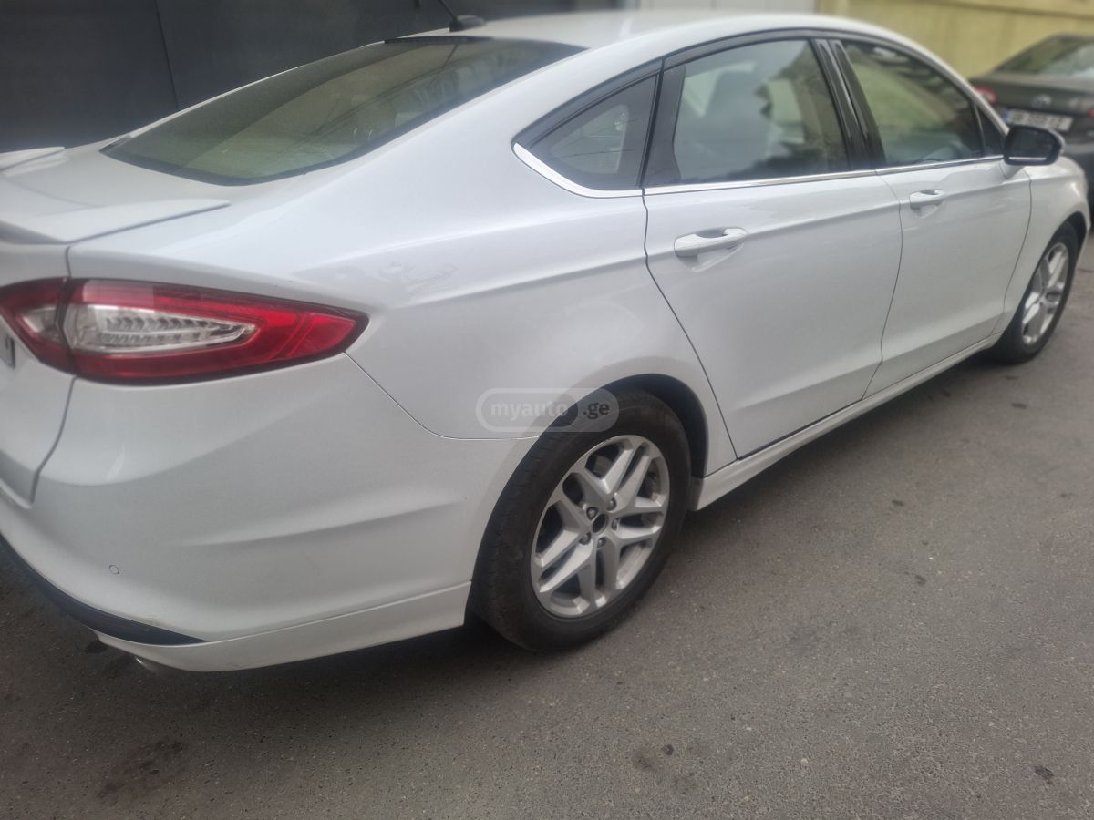 Ford Fusion - фото 7