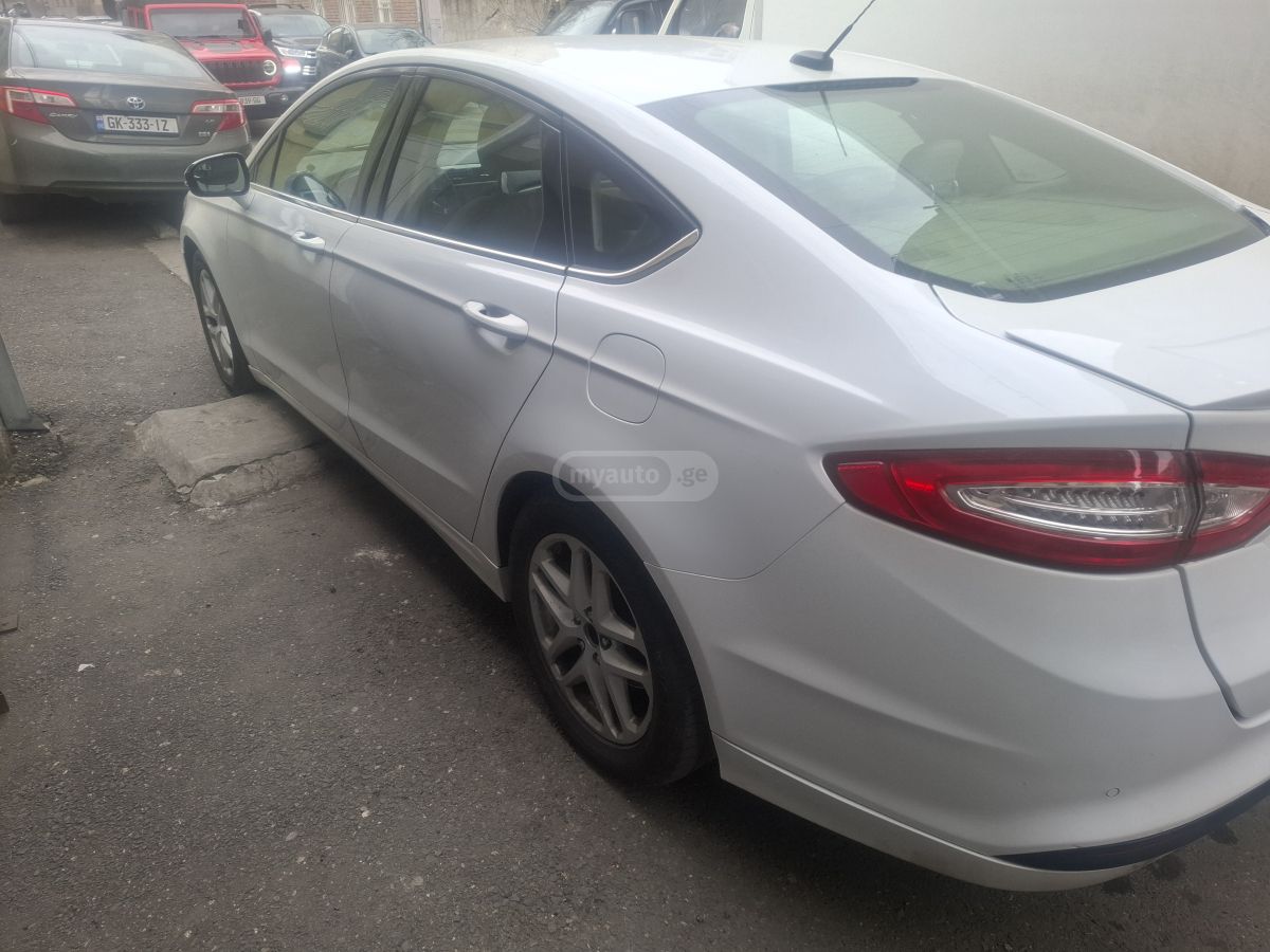 Ford Fusion - фото 8