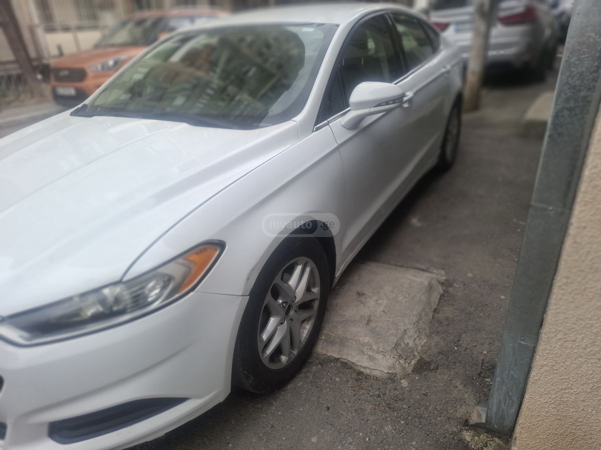 Ford Fusion - фото 9