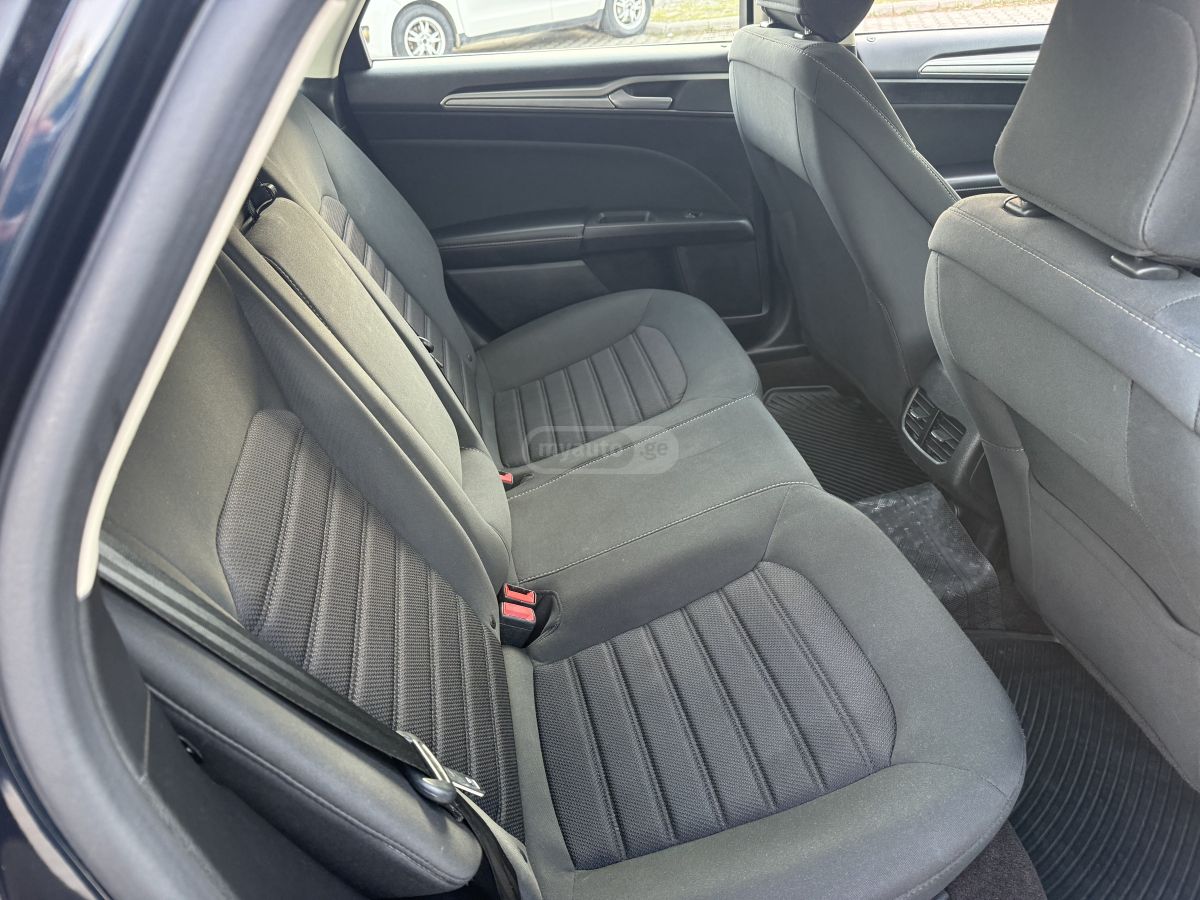 Ford Fusion - фото 7