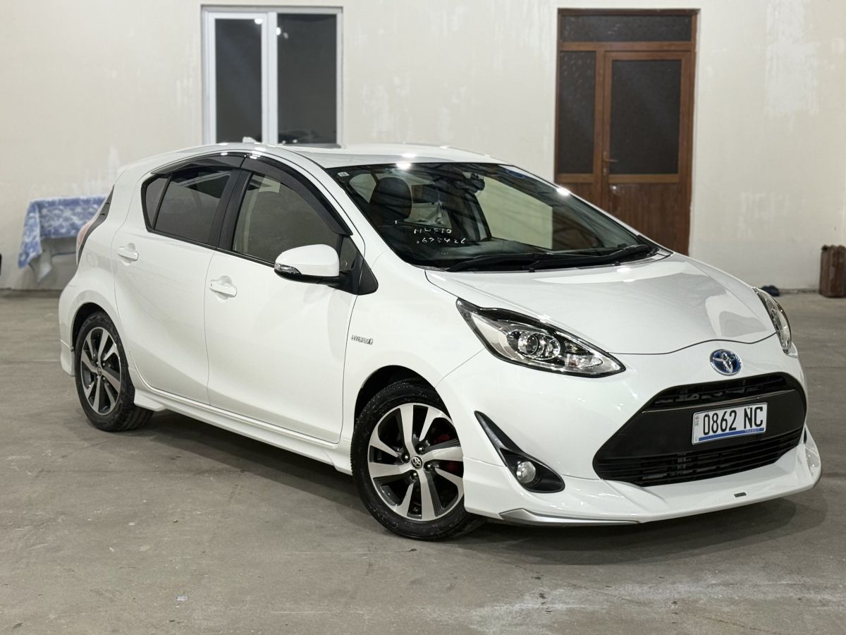 Toyota Aqua - фото 1