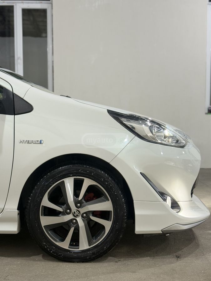 Toyota Aqua - фото 7