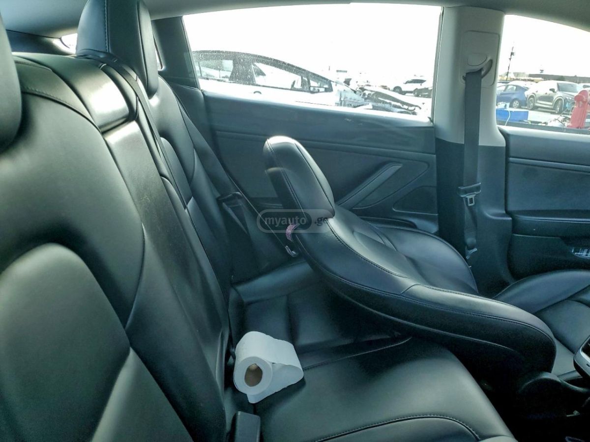 Tesla Model 3 - фото 10