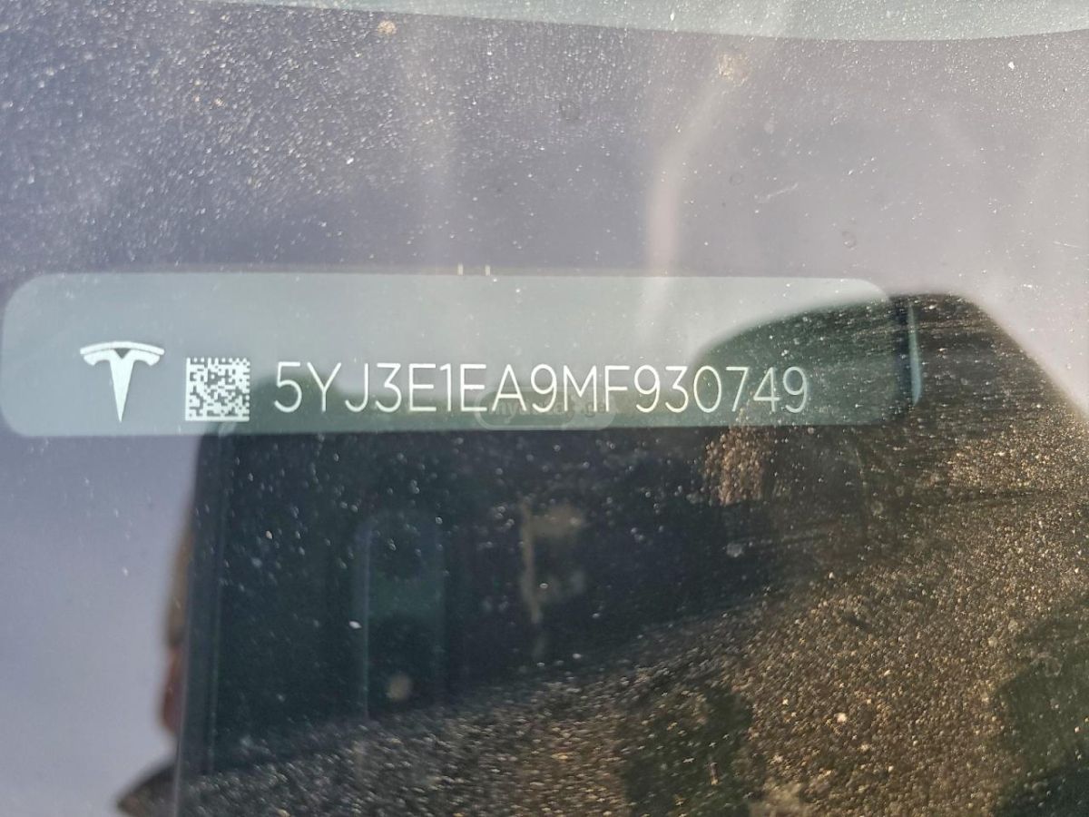 Tesla Model 3 - фото 11