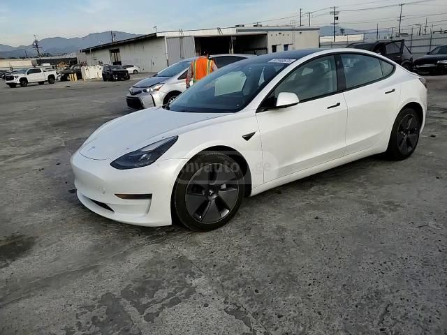 Tesla Model 3 - фото 12