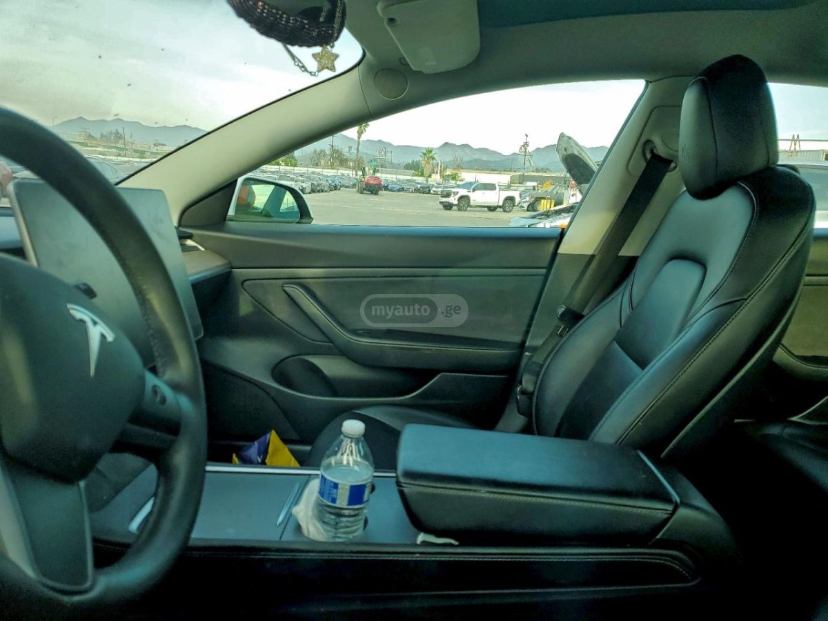 Tesla Model 3 - фото 7
