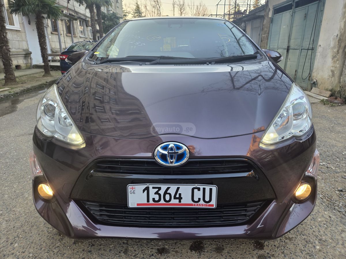 Toyota Aqua - фото 3