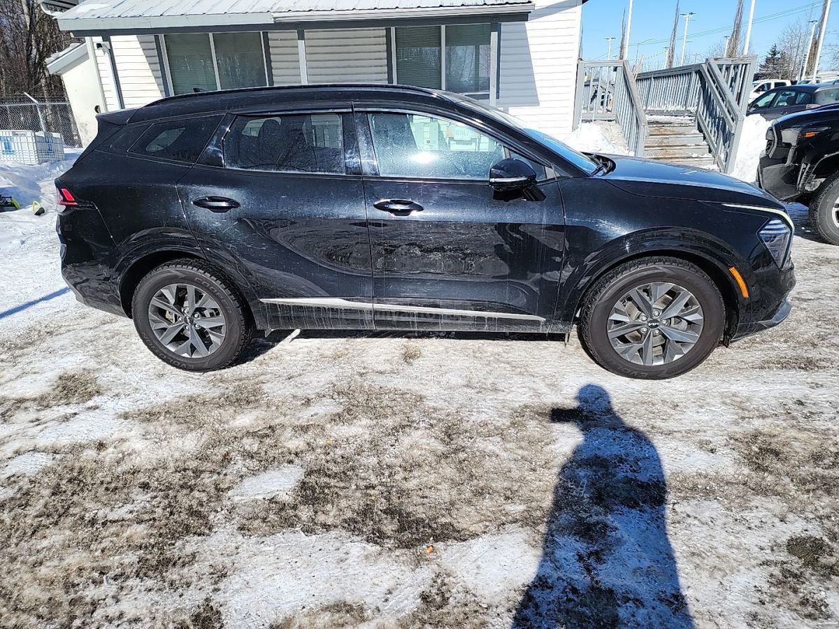 Kia Sportage - фото 6