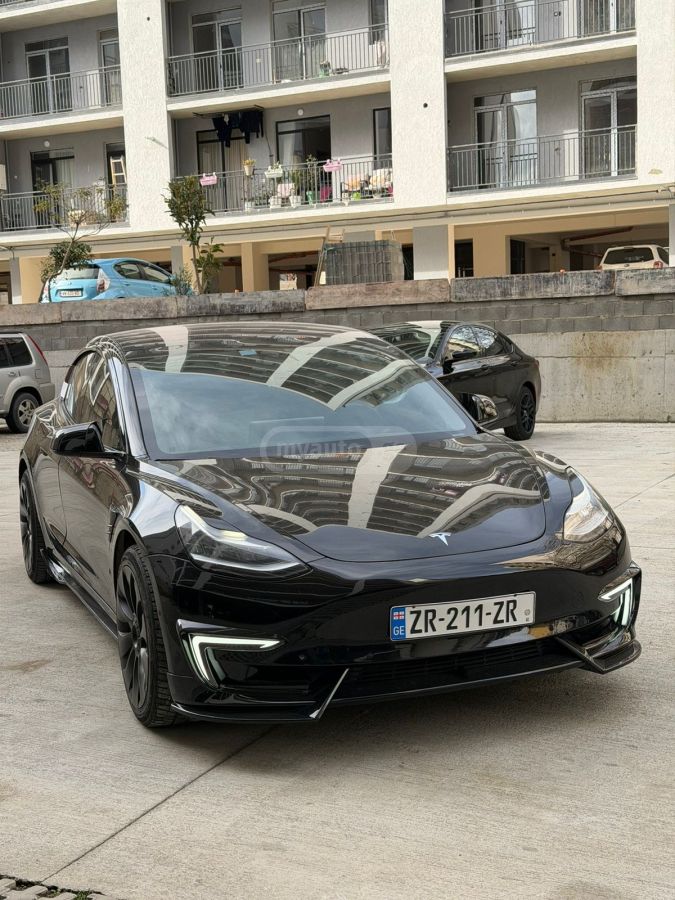 Tesla Model 3 - фото 2
