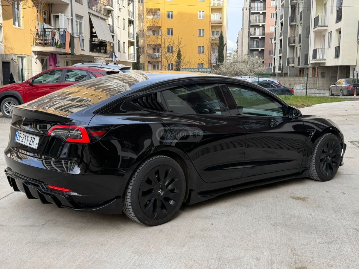 Tesla Model 3 - фото 4