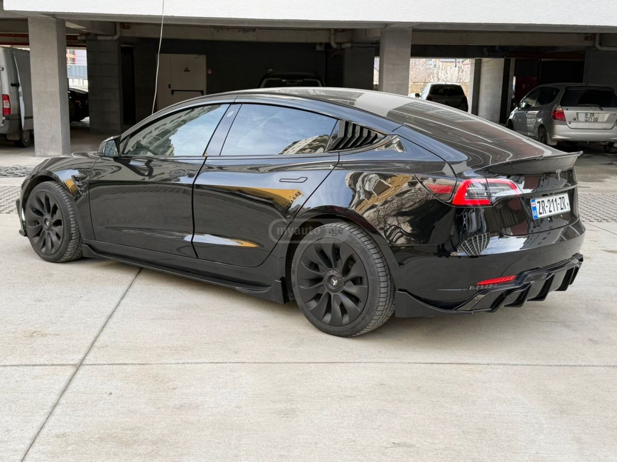 Tesla Model 3 - фото 6