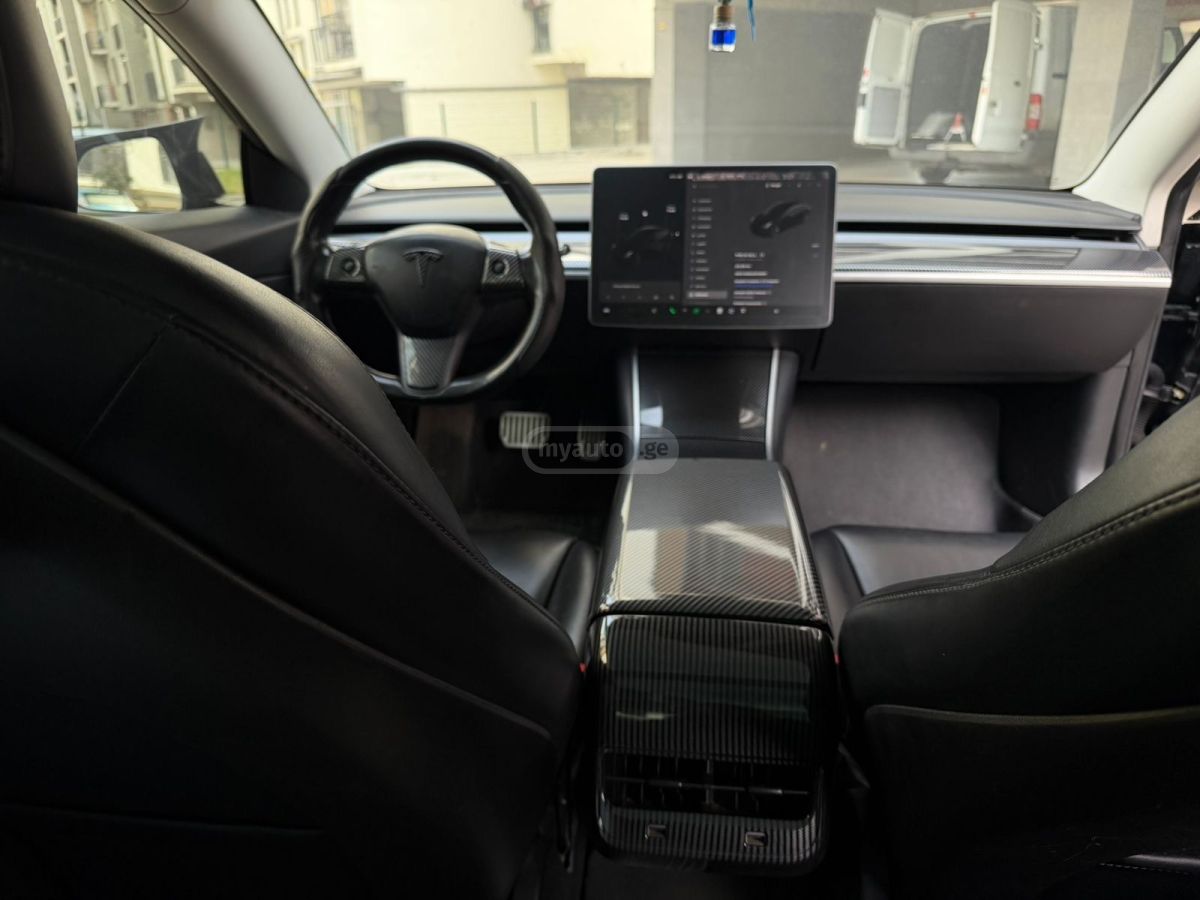 Tesla Model 3 - фото 9