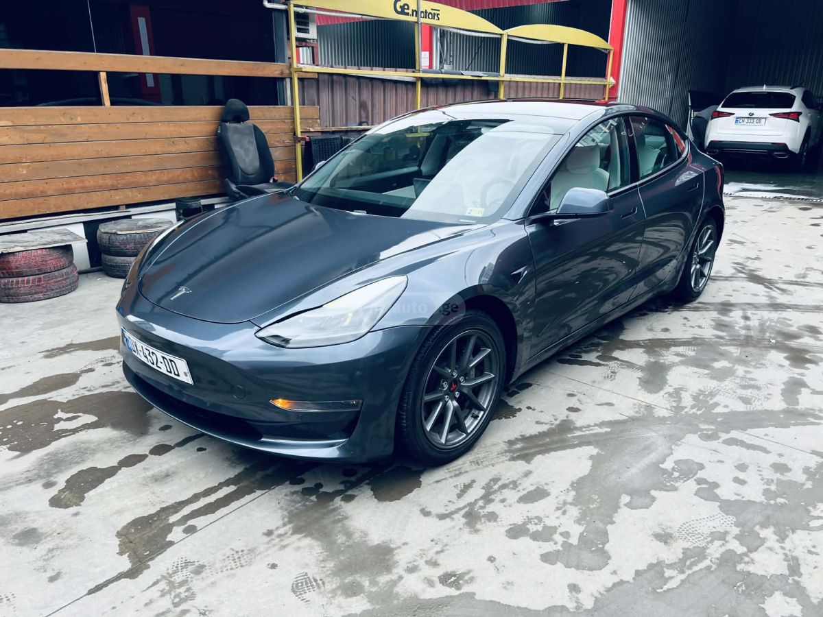 Tesla Model 3 - фото 10