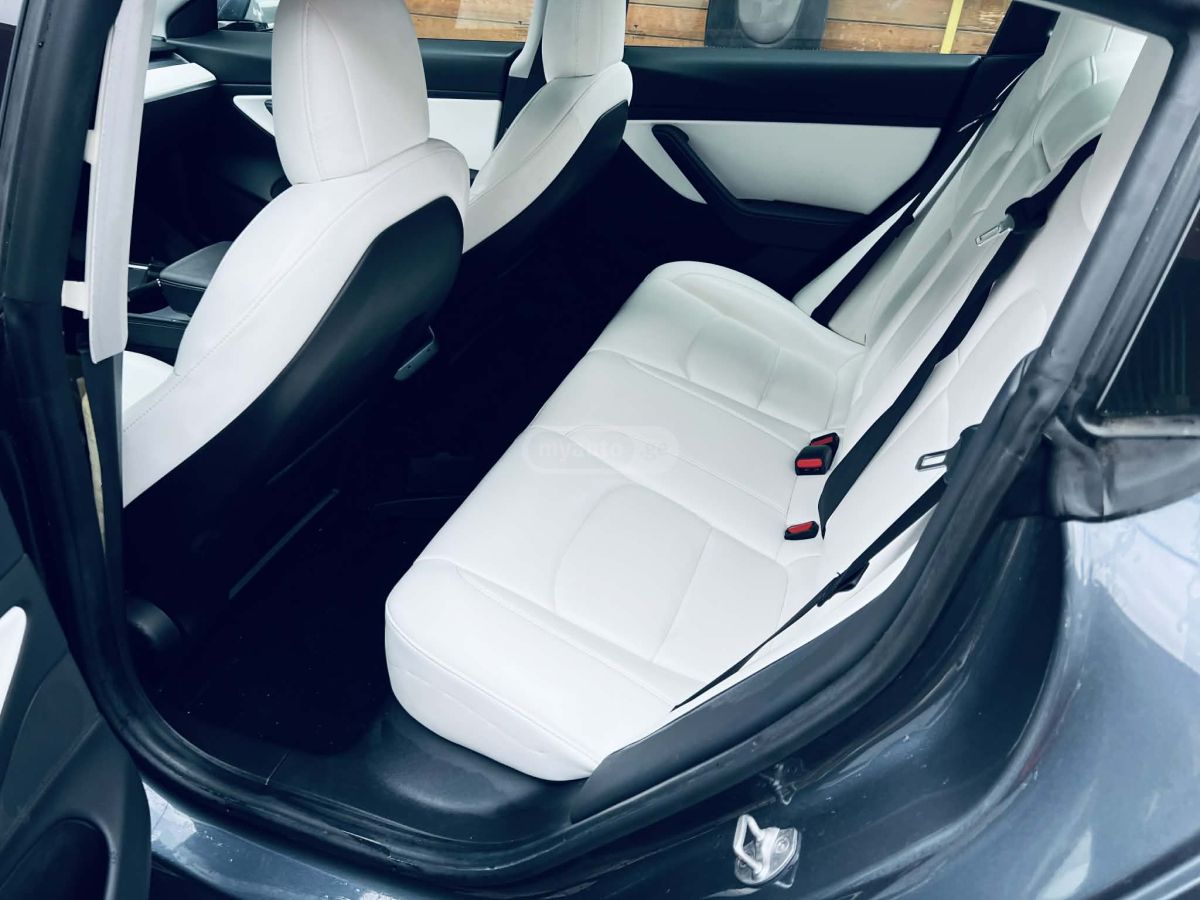 Tesla Model 3 - фото 12
