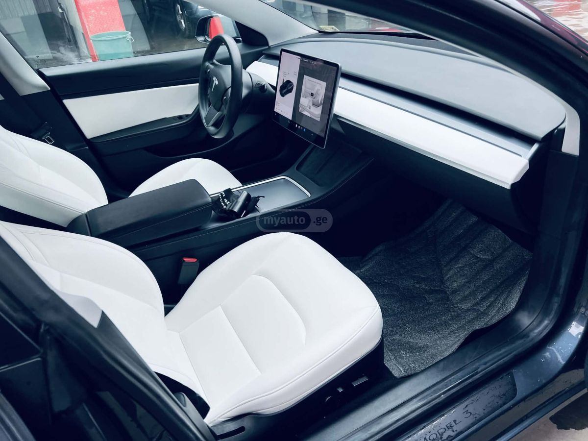 Tesla Model 3 - фото 13