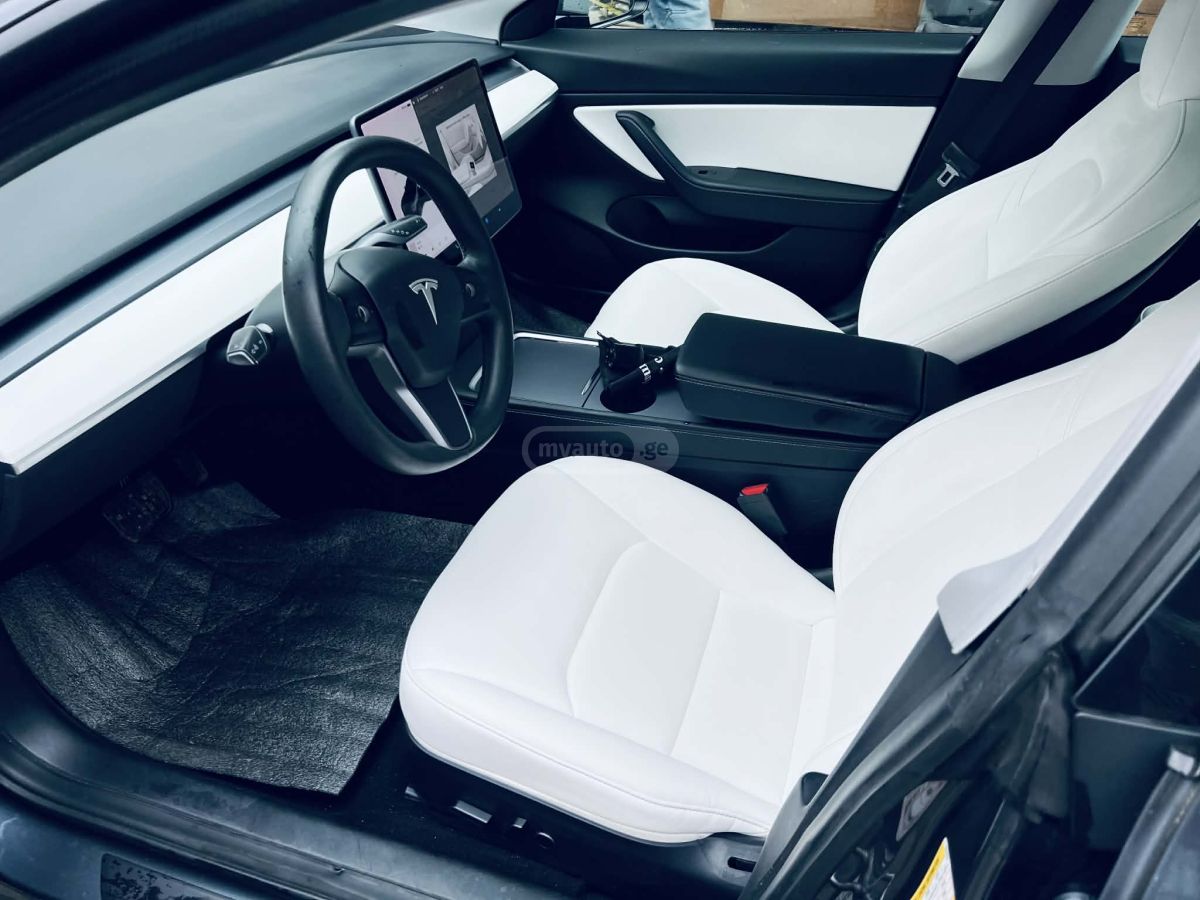 Tesla Model 3 - фото 5