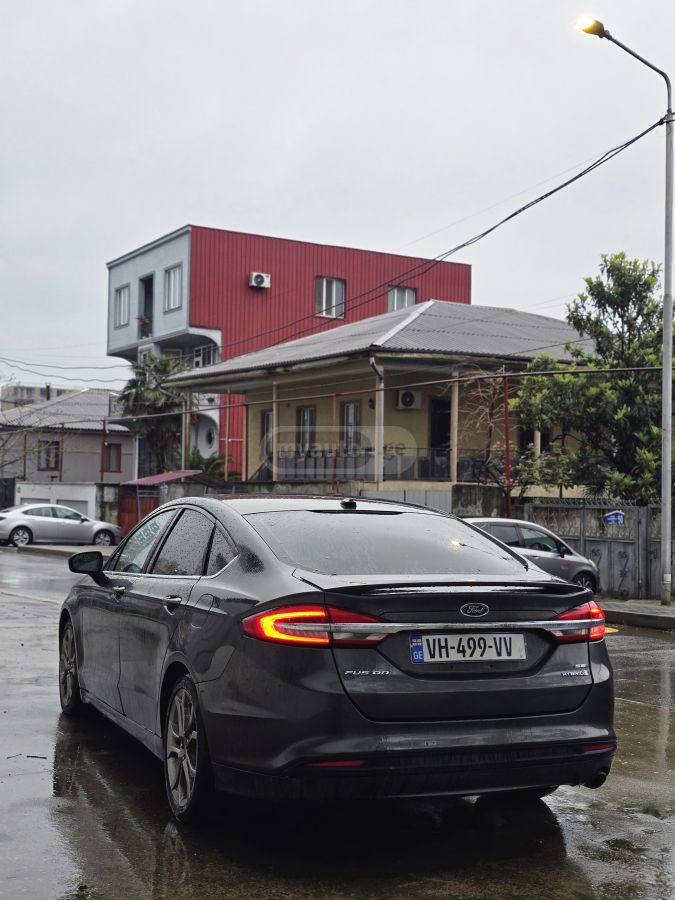 Ford Fusion - фото 7