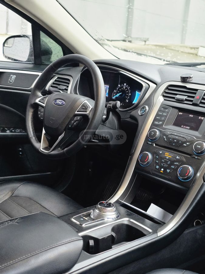 Ford Fusion - фото 9