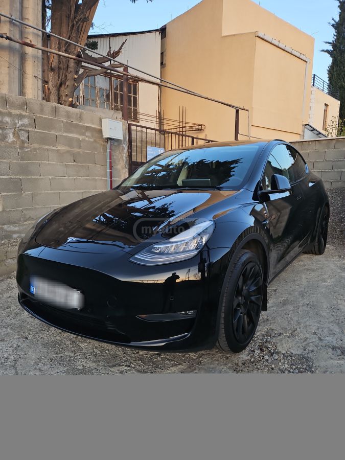 Tesla Model Y - фото 1