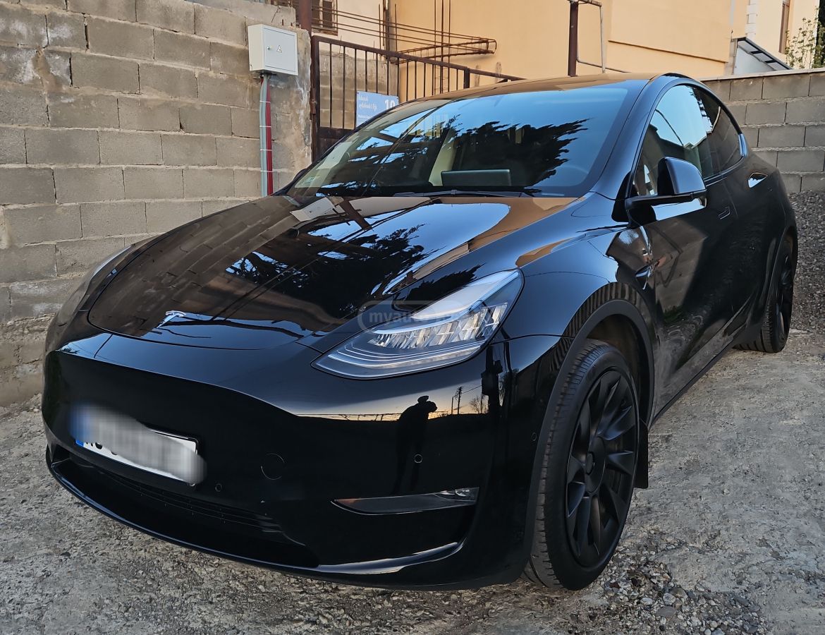 Tesla Model Y - фото 14