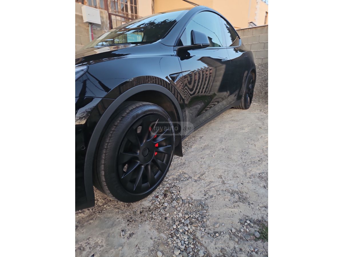 Tesla Model Y - фото 15