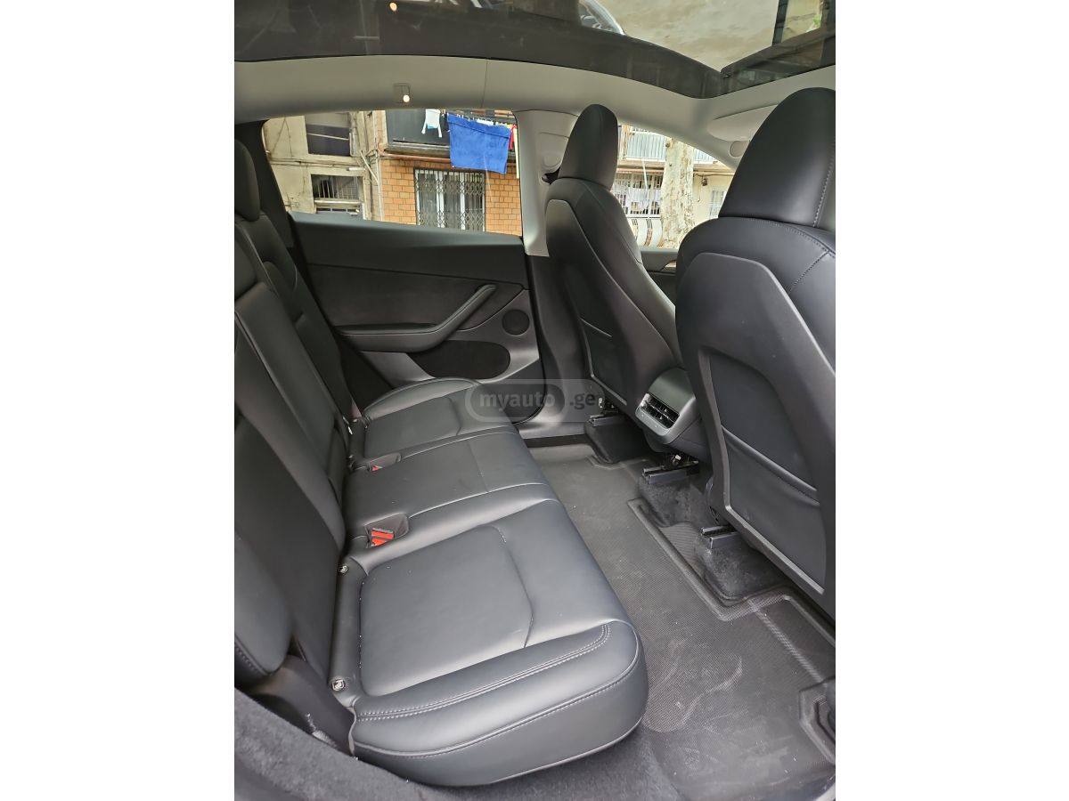 Tesla Model Y - фото 7