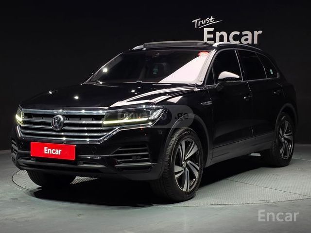 Volkswagen Touareg - фото 1