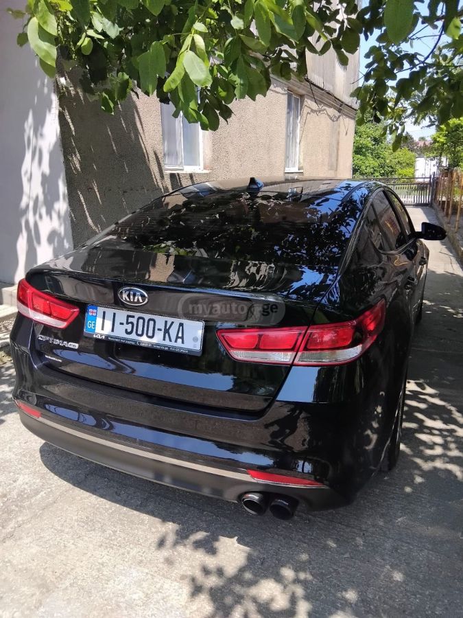 Kia Optima - фото 10