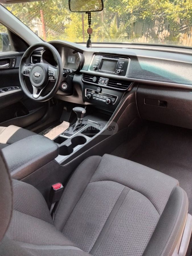 Kia Optima - фото 11