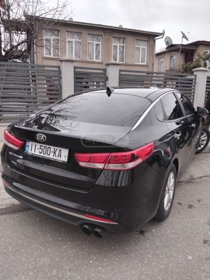 Kia Optima - фото 4