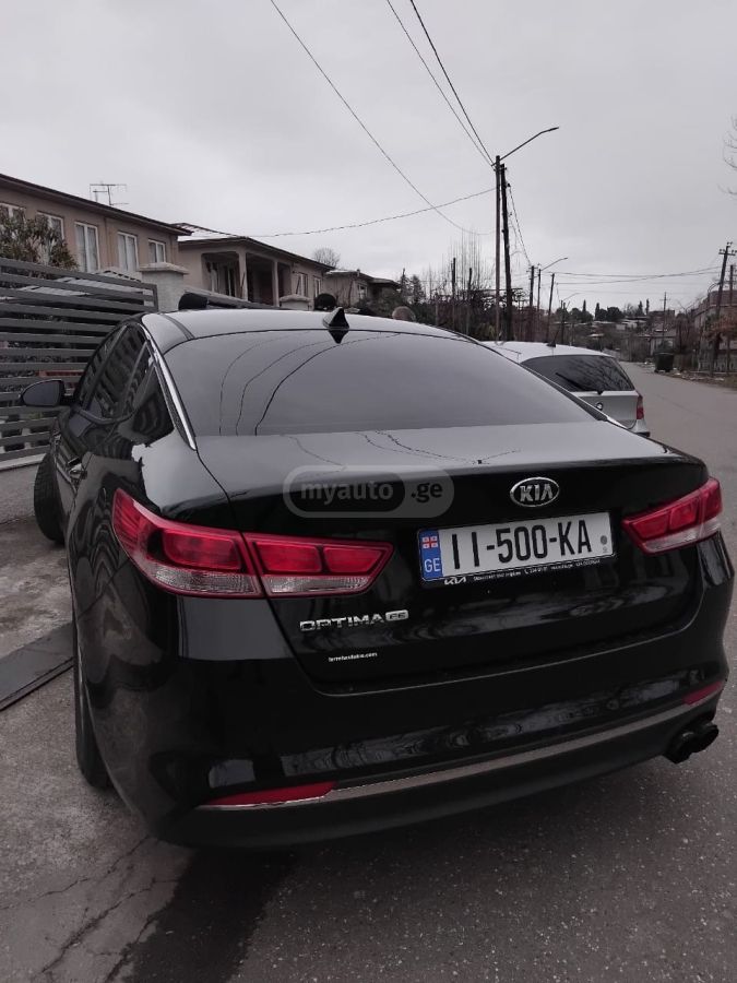 Kia Optima - фото 6