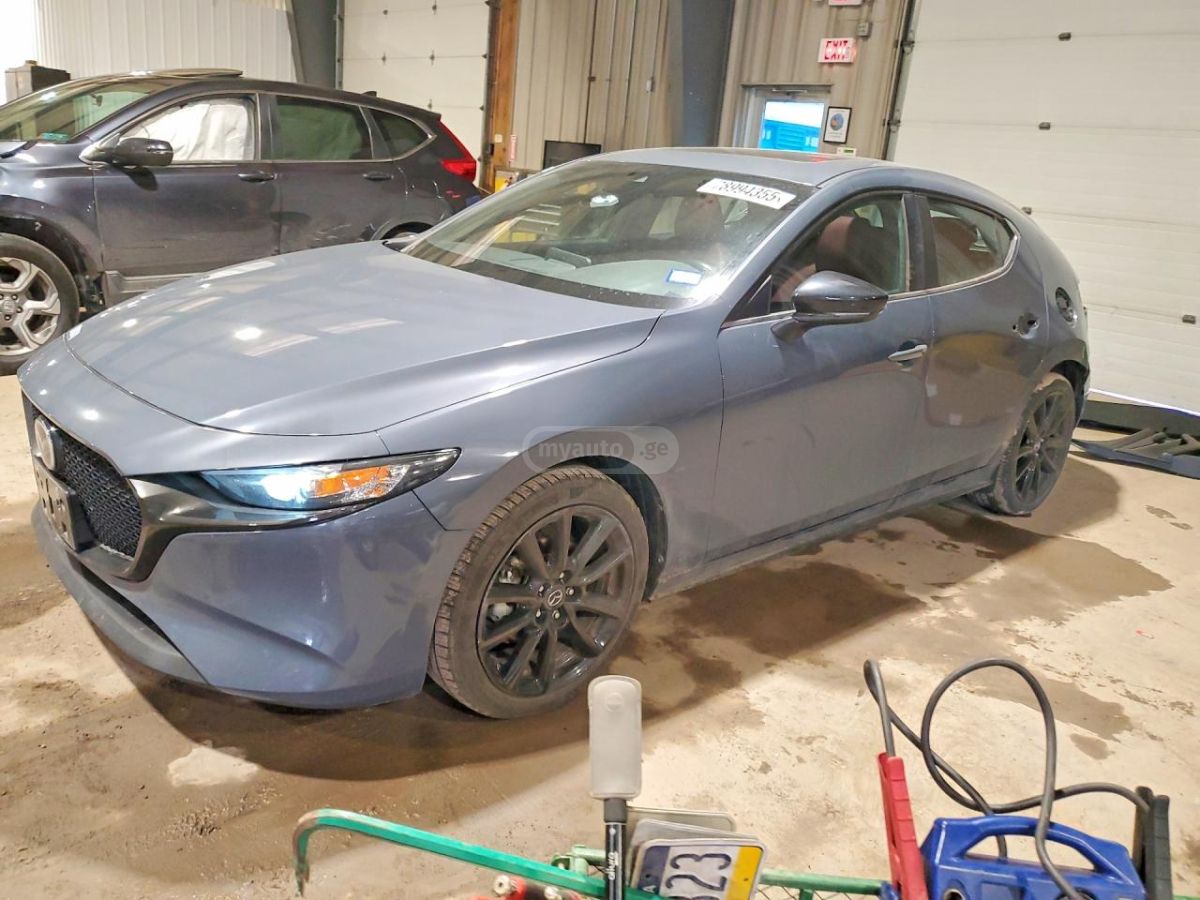 Mazda Mazda 3 - фото 1