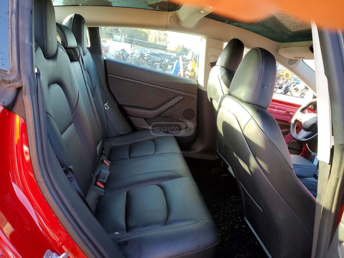 Tesla Model 3 - фото 8