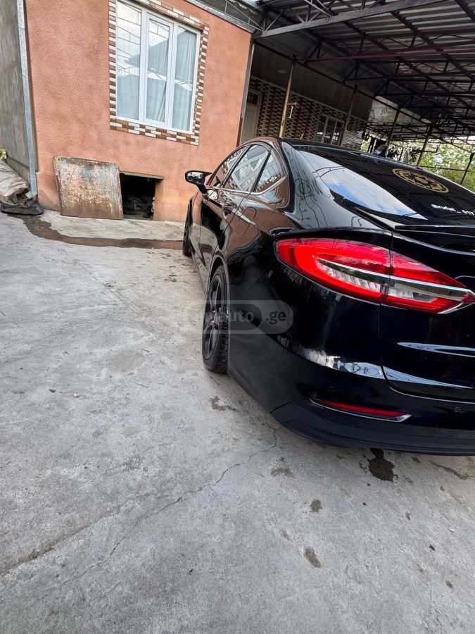 Ford Fusion - фото 8