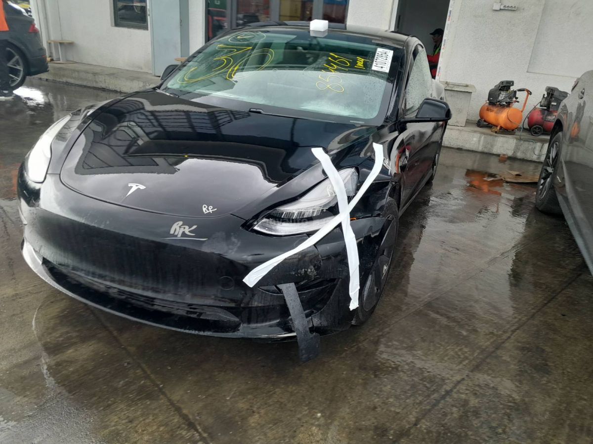 Tesla Model 3 - фото 7