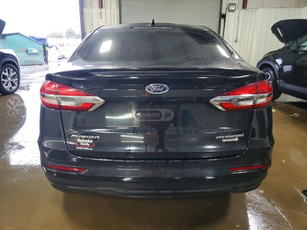 Ford Fusion - фото 6