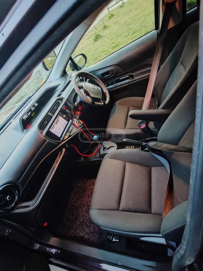 Toyota Aqua - фото 7