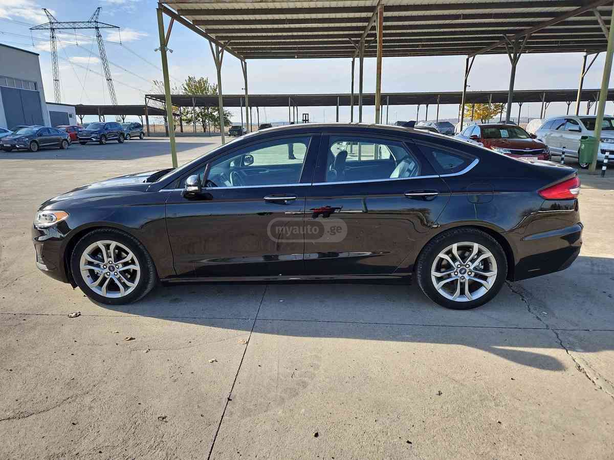 Ford Fusion - фото 11