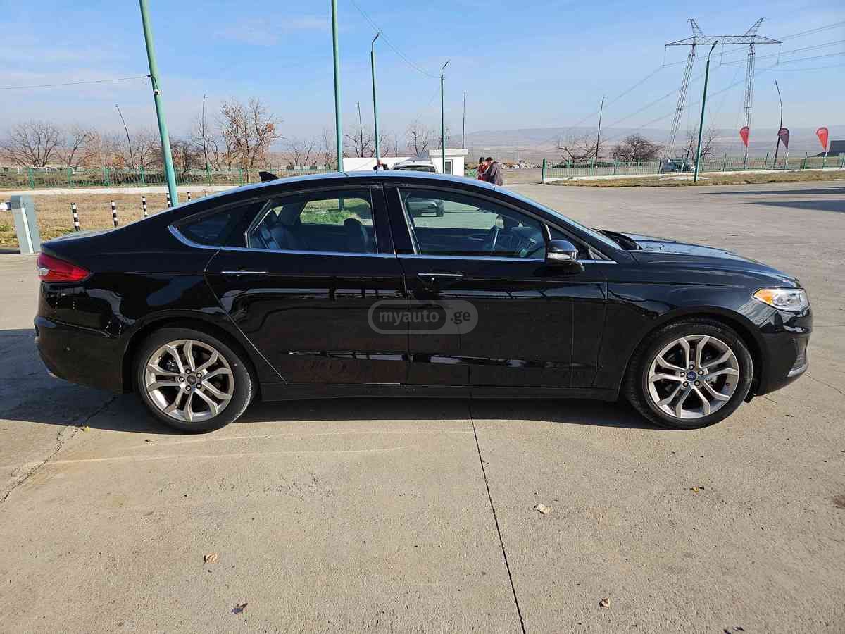 Ford Fusion - фото 7