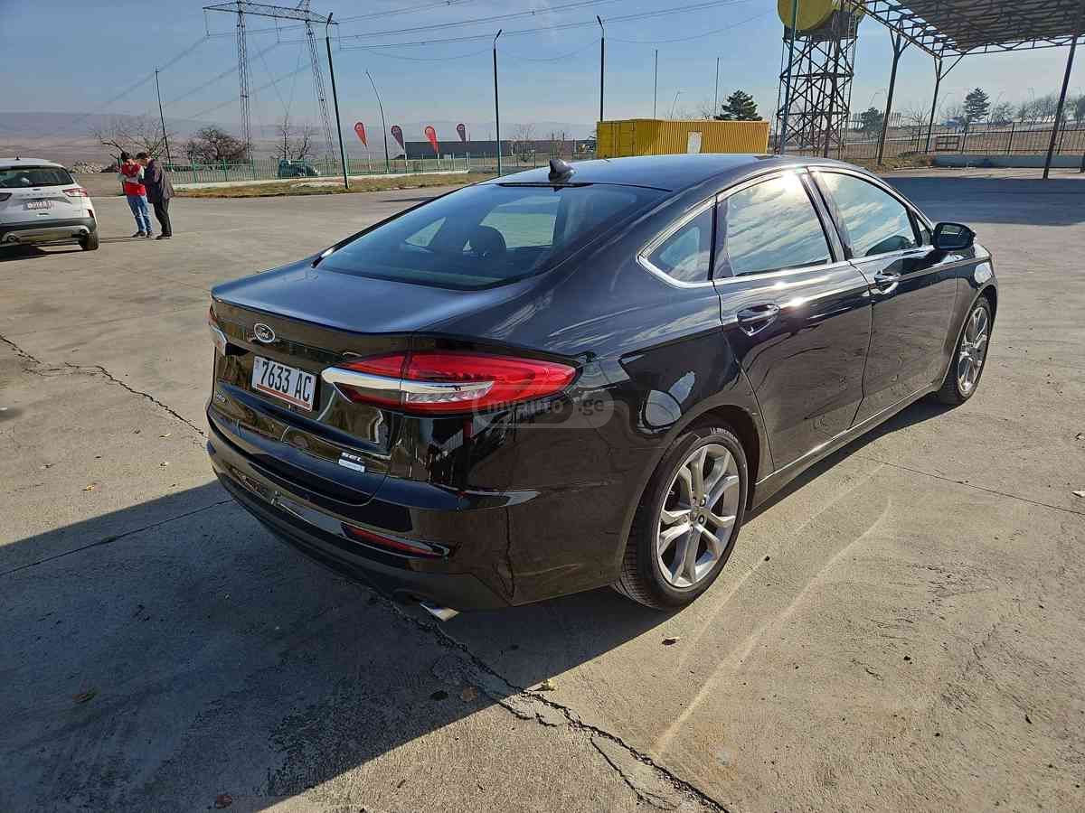 Ford Fusion - фото 8