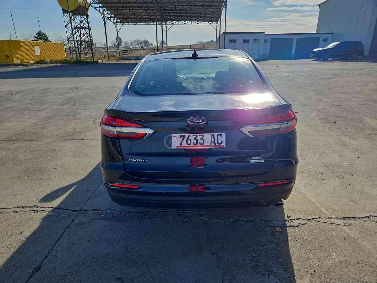 Ford Fusion - фото 9