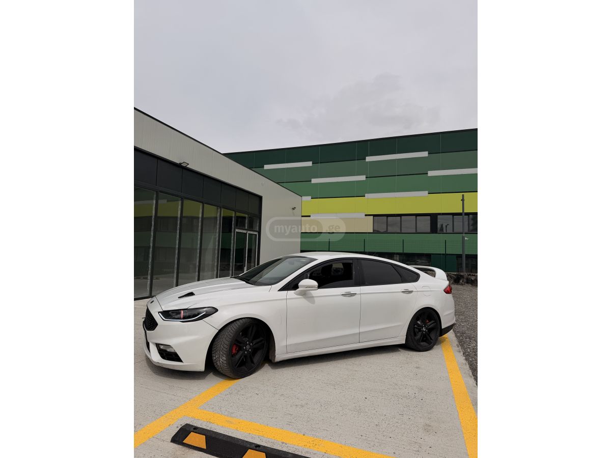 Ford Fusion - фото 10