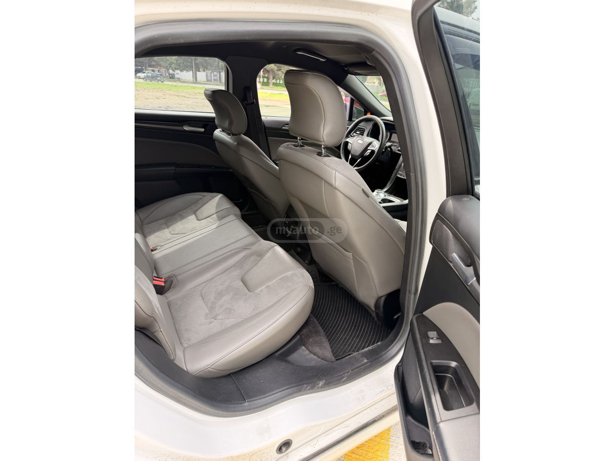 Ford Fusion - фото 11