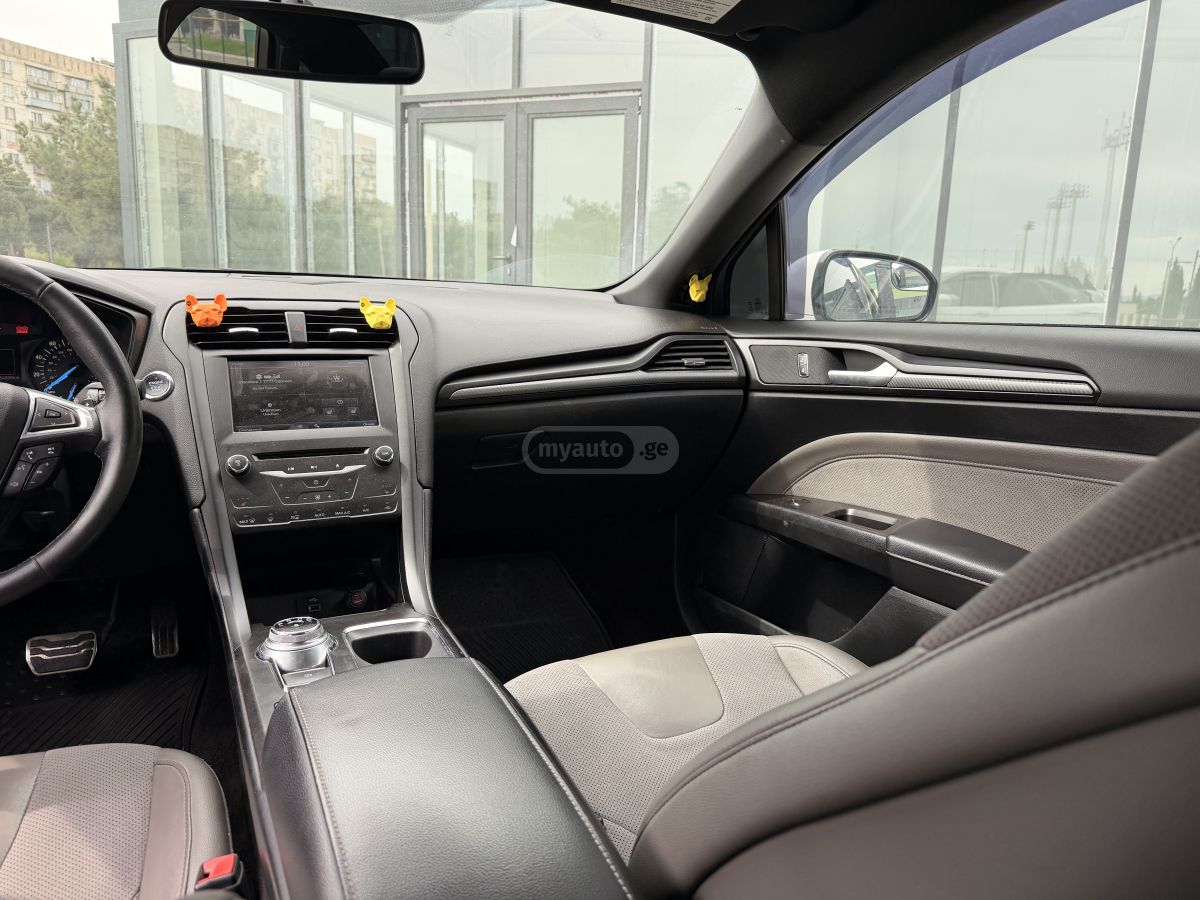 Ford Fusion - фото 13