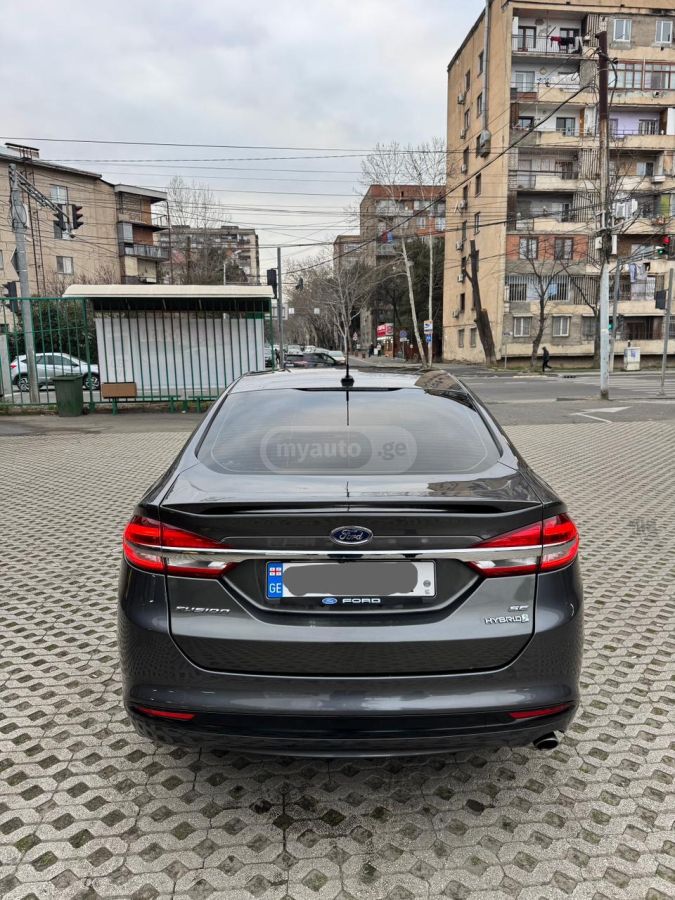 Ford Fusion - фото 7