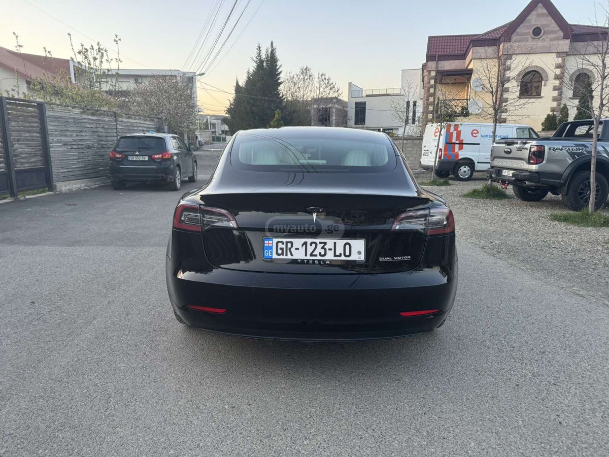 Tesla Model 3 - фото 7