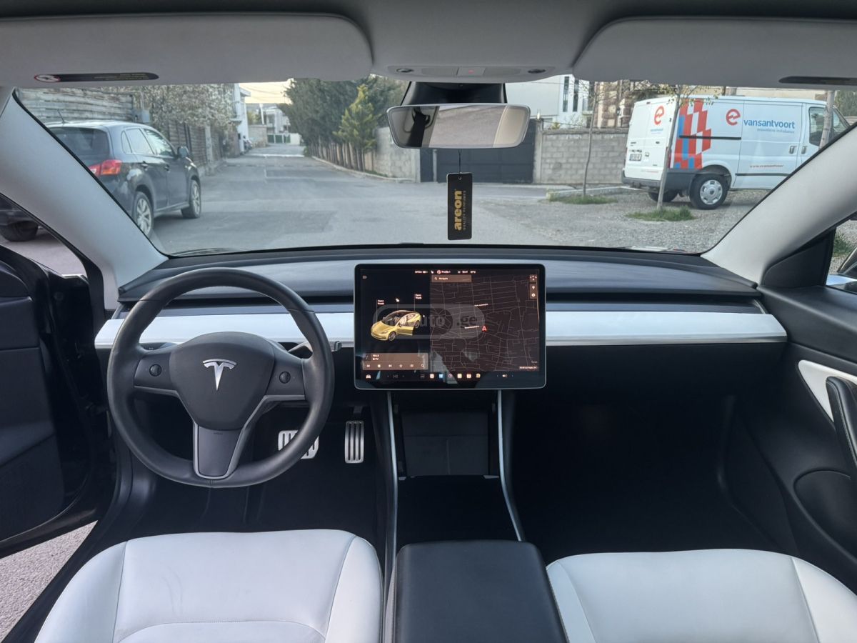 Tesla Model 3 - фото 9